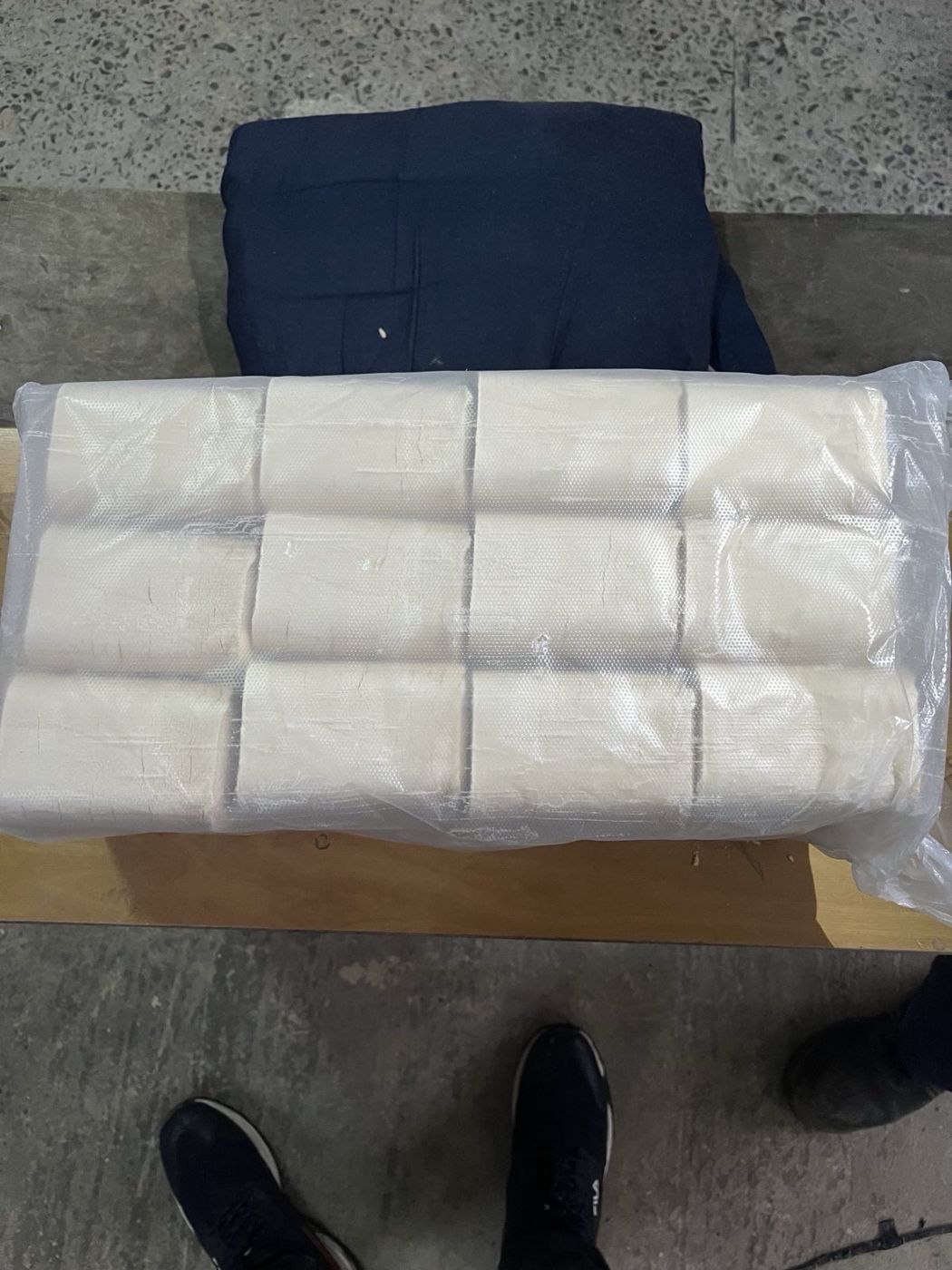 Stacked packs of ODEK birch RUF briquettes