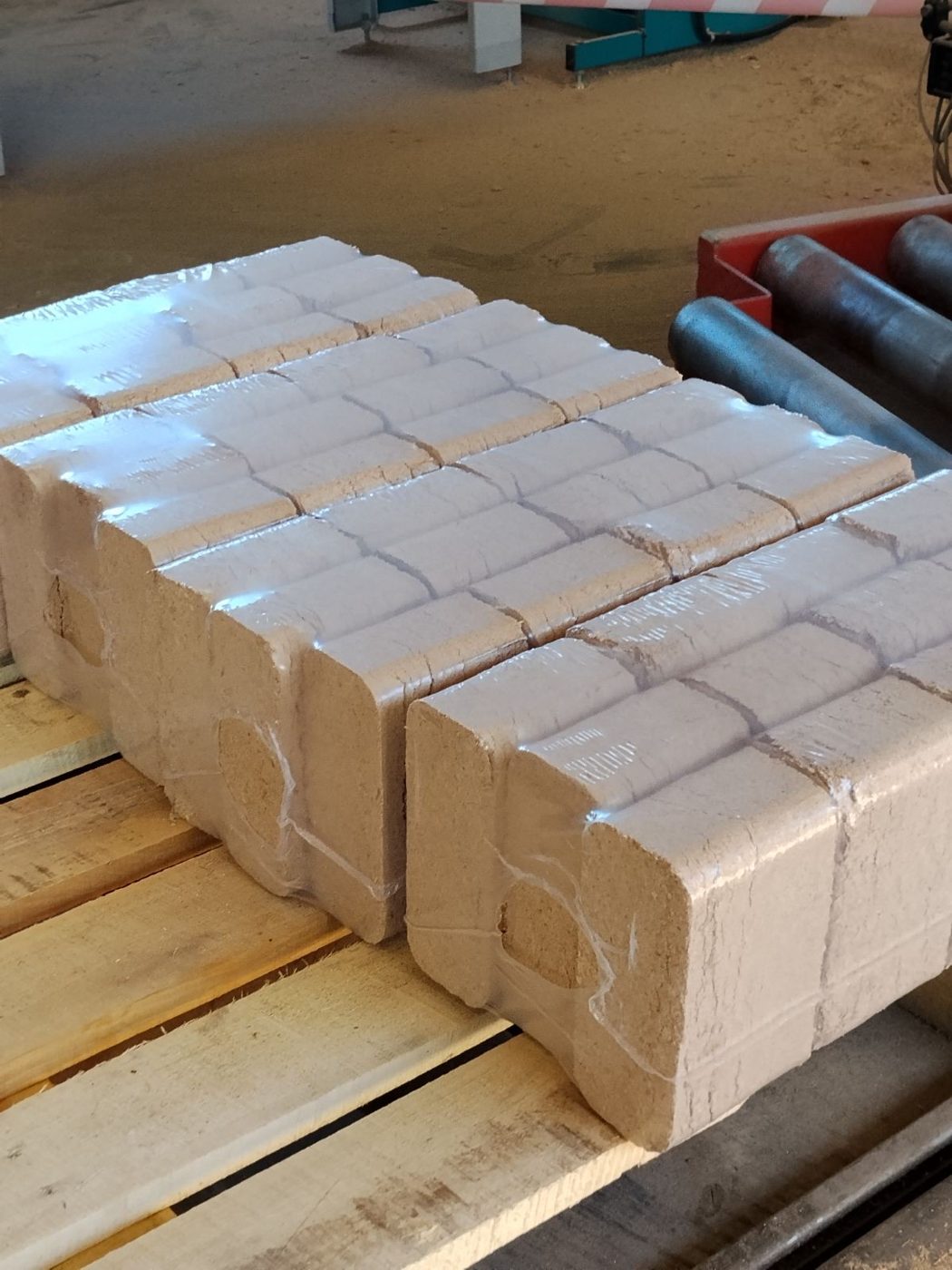 Shrink-wrapped packs of beech RUF briquettes