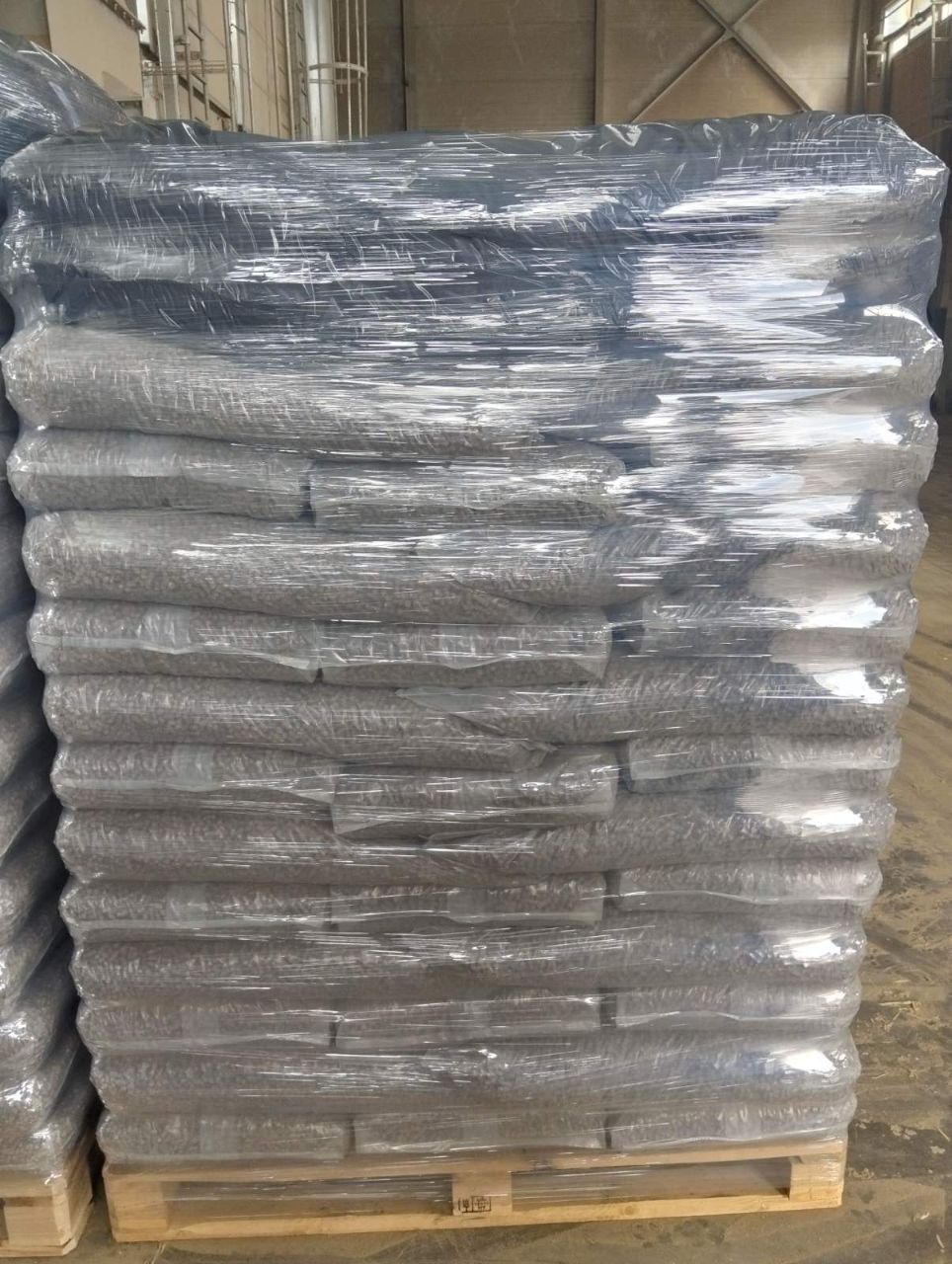 Pallet of bagged wheat straw pellets